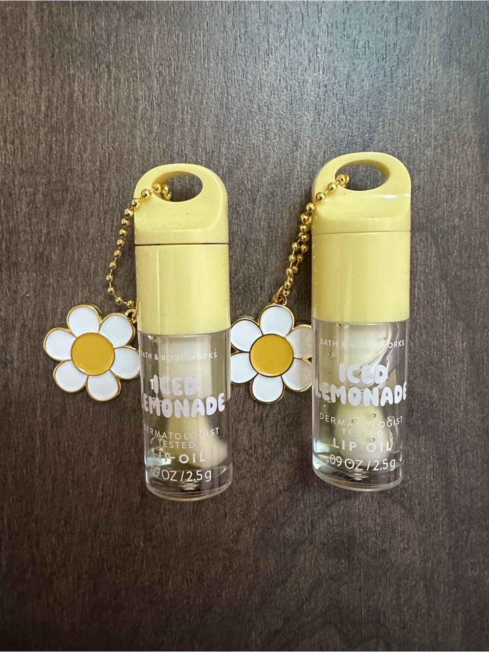 Bath & Body Works Yellow Iced Lemonade Lip Oils with Daisy Charms set of 2